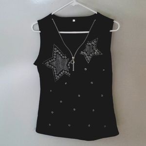Black sleeveless top with silver zipper and detail. Size large